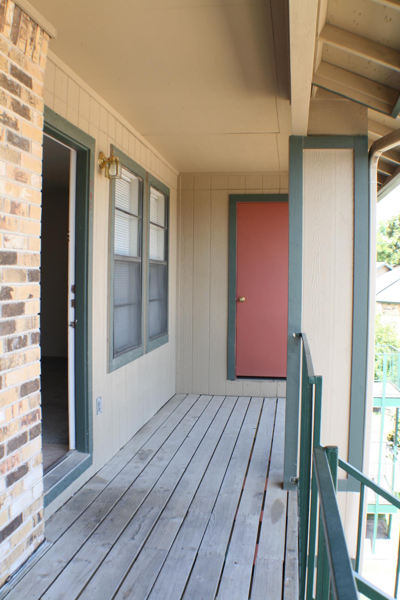 A front door entrance to an apartment at Stadium View.